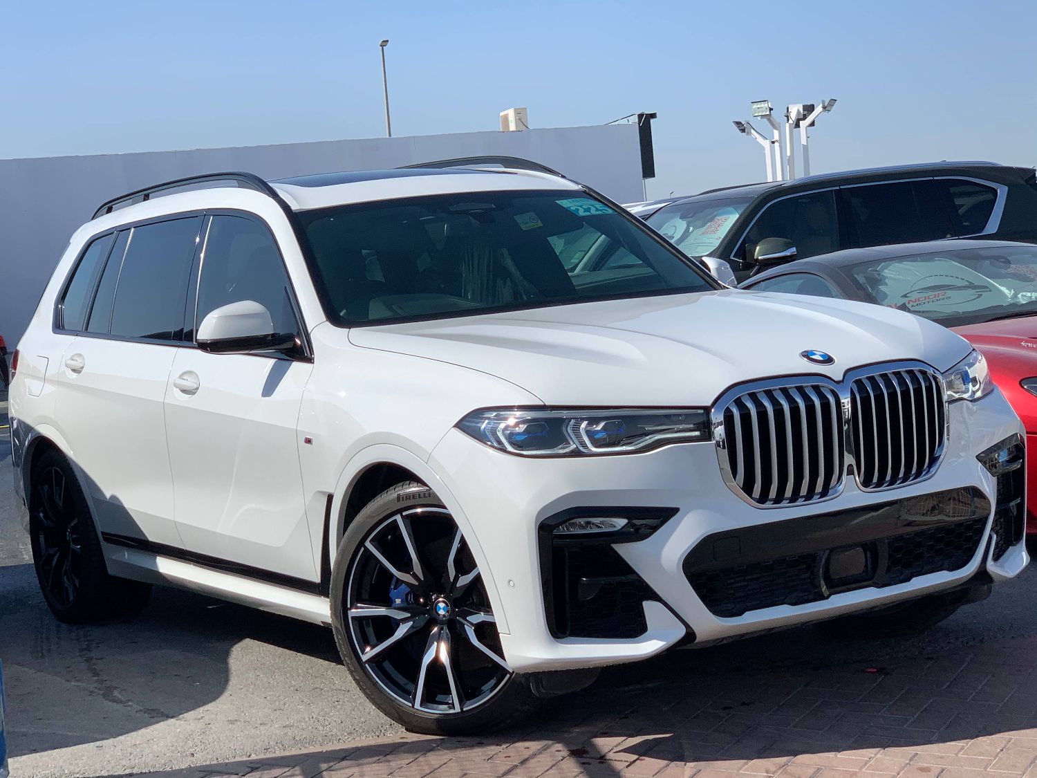 BMW X7 front + side view